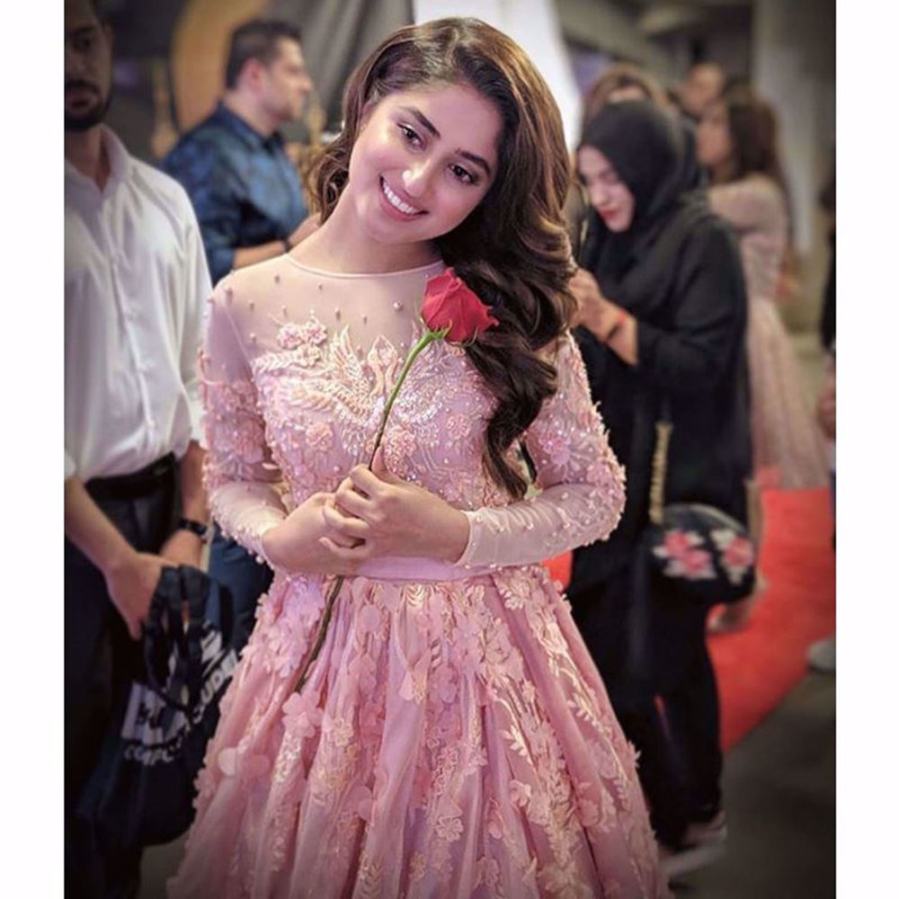 Picture of SAJAL ALY WEARS OUR PEACH PINK TULLE GOWN WITH HAND CRAFTED DETAILS