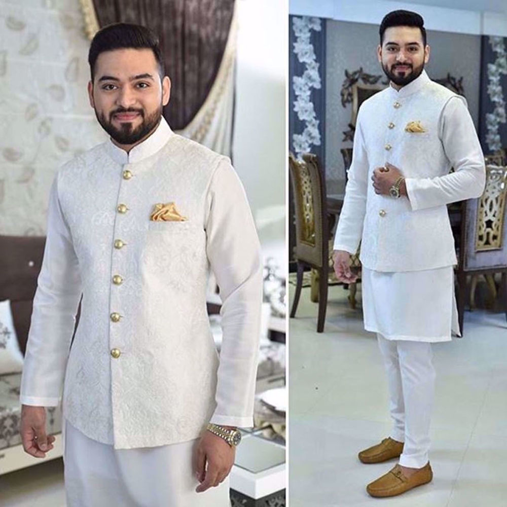 Picture of FAYYAZ EJAZ IN A WHITE EMBROIDERED WAISTCOAT PAIRED WITH STRAIGHT PAJAMAS