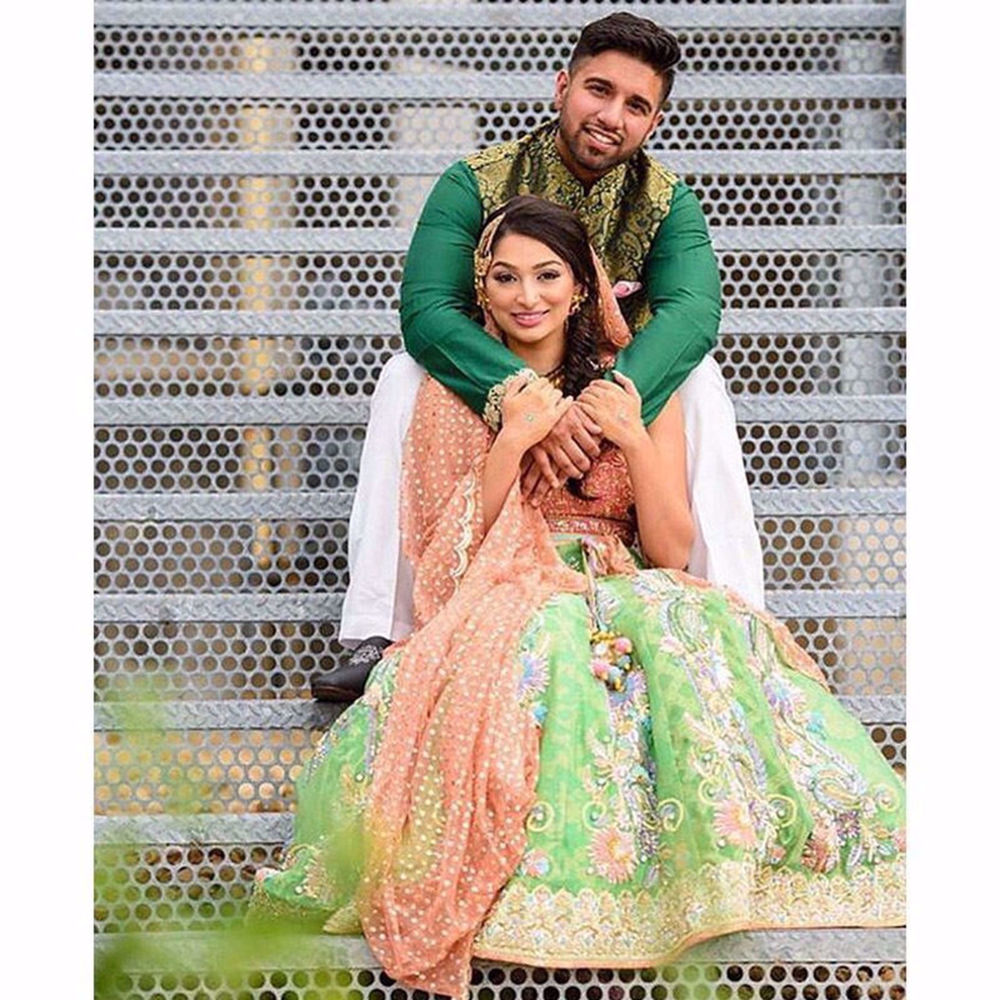 Picture of KINZA KHAN IN A LIME GREEN LEHENGA WITH PEACH DUPATTA AND CHOLI