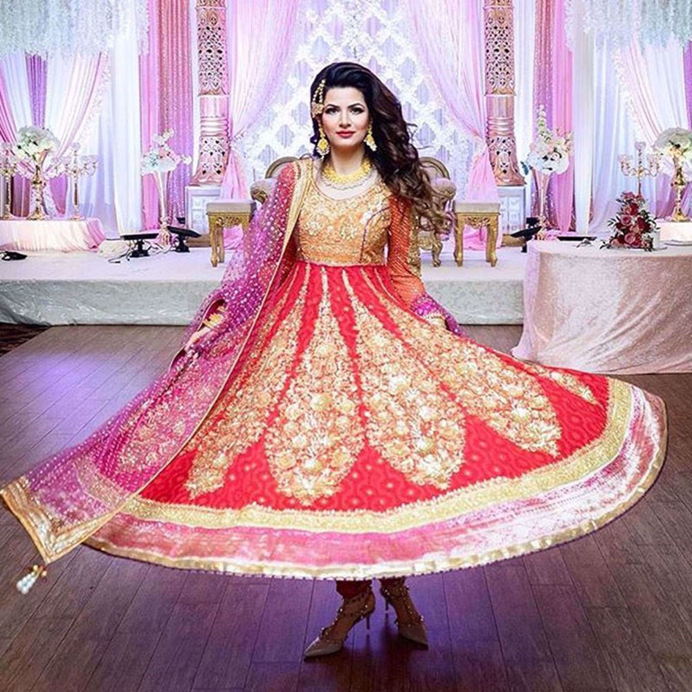 Picture of OUR CLIENT MADEEHA IQBAL LOOKING SPECTACULAR AT A WEDDING FUNCTION IN OUR SCARLET ANARKALI