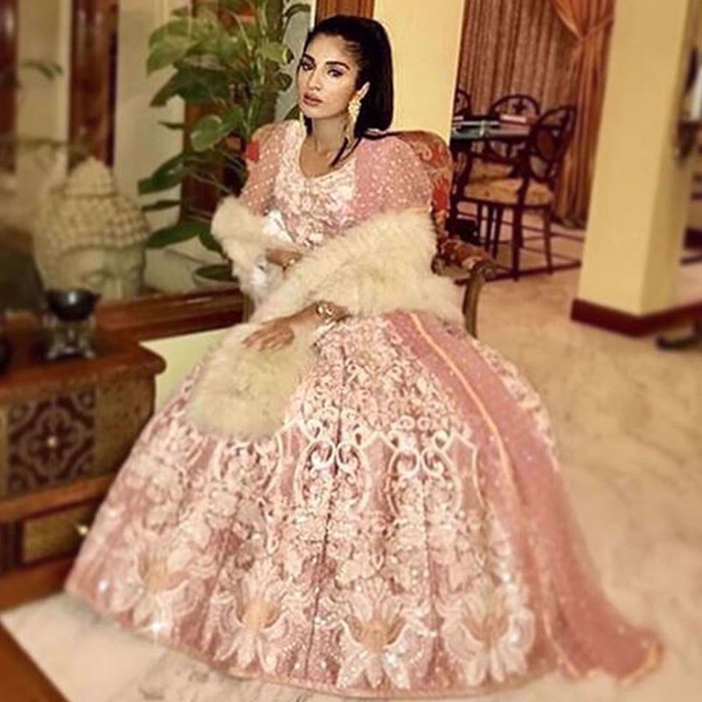 Picture of SUHANA J BAIG SPOTTED WEARING A DREAM PINK EMBROIDERED LEHENGA AND CHOLI