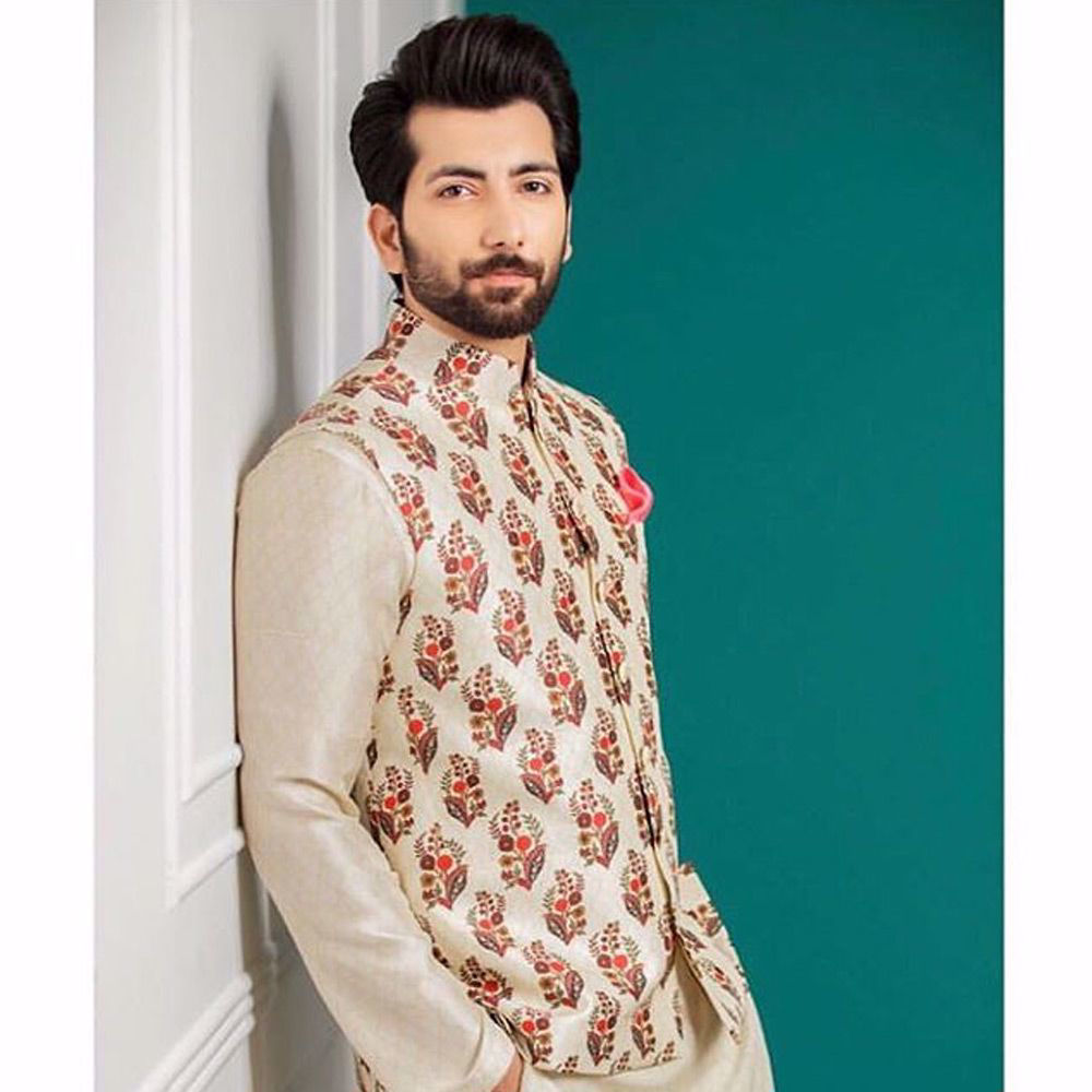 Picture of We re Always excited to bring something special for you. Ali khan wears our signature printed waist coat paired with a printed kurta and straight pants. .