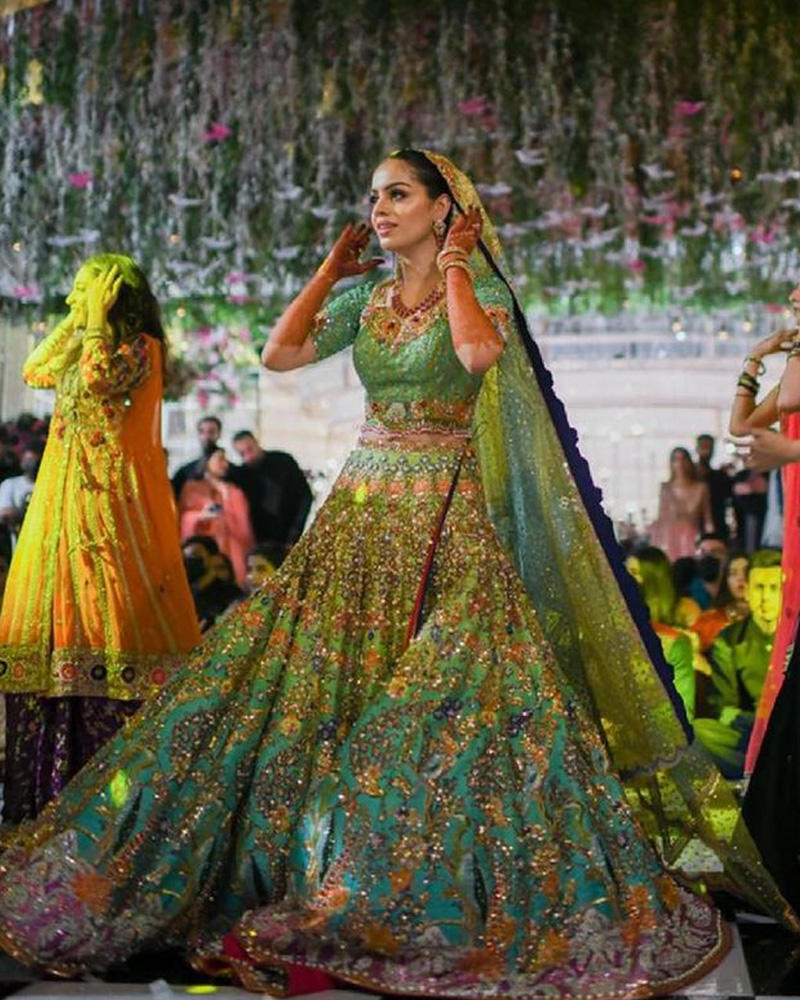 Picture of An immaculately fitted half sleeved choli and ombré base lehnga in tones of green with bedazzled hand work and a two toned dupatta, Mariam’s look comes together beautifully for a night of celebration!