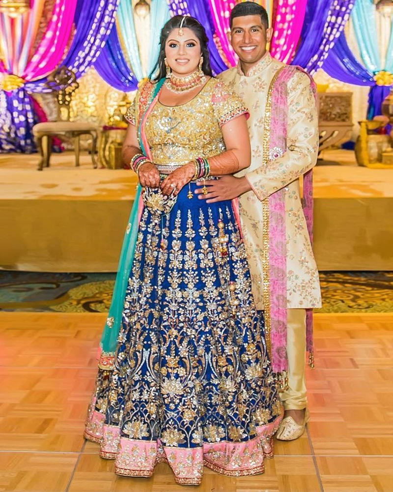 Picture of Sehar Khalid chose this beautiful combination of blue, saffron and sea green for her sangeet, worked impeccably with gold and silver hand embellishments, with a touch of pink to pull the look together perfectly.